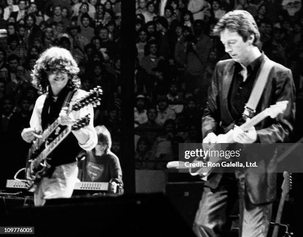 Musicians Jimmy Page of Led Zeppelin and Eric Clapton perform at Action Research into Multiple Sclerosis Benefit Concert on December 9, 1983 at...