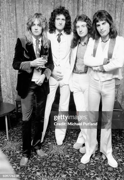 Drummer Roger Taylor, guitarist Brian May, bassist John Deacon and singer Freddie Mercury of British rock band Queen pose in September 1974.