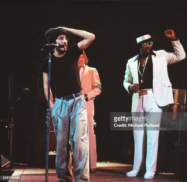 American singer Bruce Springsteen performing on stage with Clarence Clemons of the E Street Band at the Hammersmith Odeon in London, England on...