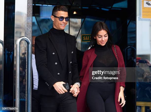 Cristiano Ronaldo leaves with his girlfriend Georgina Rodriguez after attending a court hearing for tax evasion at Audiencia Provincial on January...