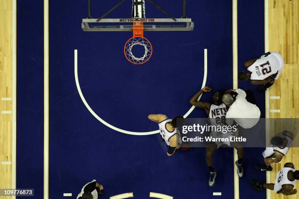 Anthony Morrow lies on the court after a heavy fall during the NBA match between New Jersey Nets and the Toronto Raptors at the O2 Arena on March 4,...