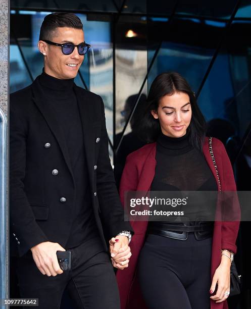 Cristiano Ronaldo leaves with his girlfriend Georgina Rodriguez after attending a court hearing for tax evasion at Audiencia Provincial on January...