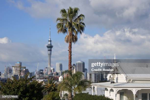 Victorian house against Auckland city skyline in Auckland New Zealand.