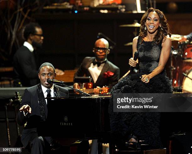 Hosts Wayne Brady and Holly Robinson Peete perform onstage at the 42nd NAACP Image Awards held at The Shrine Auditorium on March 4, 2011 in Los...