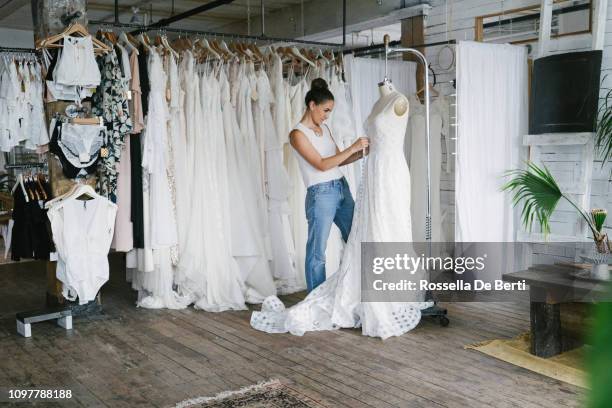 fashion designer creating gowns - haute couture store stock pictures, royalty-free photos & images