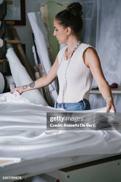 fashion designer creating gowns - rolled up stock pictures, royalty-free photos & images