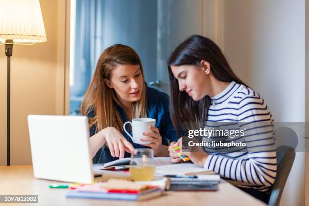 involved in her daughter's education - guardian stock pictures, royalty-free photos & images