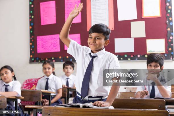 schoolkids in classroom - stock image - indian politics stock pictures, royalty-free photos & images