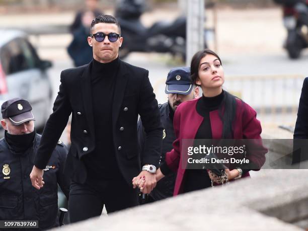 Cristiano Ronaldo arrives with girlfriend Georgina Rodriguez at the Audiencia Provincial de Madrid court on January 22, 2019 in Madrid, Spain. The...