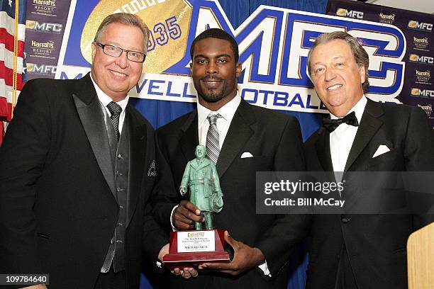 Ron Jaworski, Michael Vick, Philadelphia Eagles QB and winner of the 52nd Annual Bert Bell Award for the Professional Player of the Year along with...
