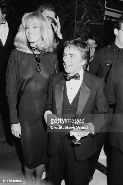 American actress and singer Susan Anton and English actor, comedian and musician Dudley Moore attend gala dinner to honour Prince Andrew by the...