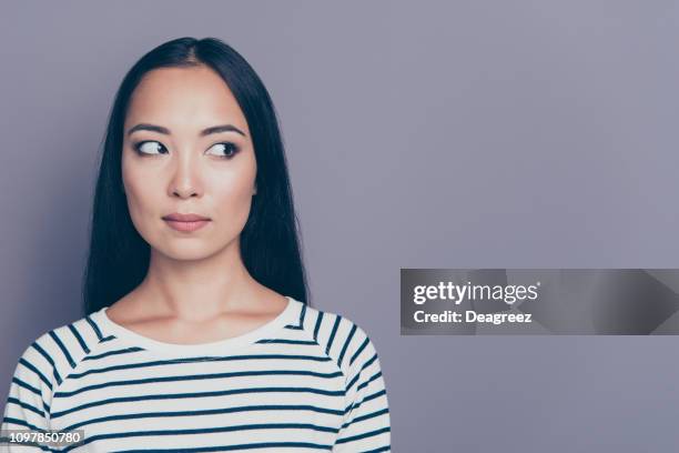 Close up portrait of beautiful attractive amazing brunette she her girl did bad thing fake pretend everything ok okay looking scared afraid wearing white pullover isolated on grey background