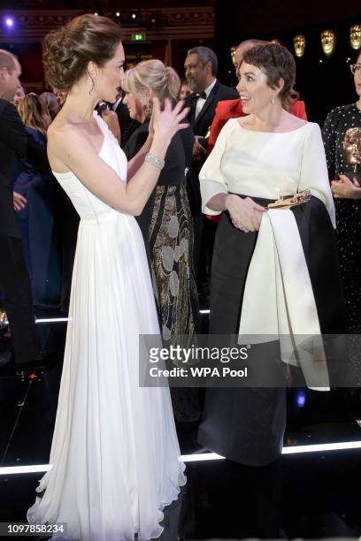 Catherine, Duchess of Cambridge meets Olivia Colman after the following the EE British Academy Film Awards at Royal Albert Hall on February 10, 2019...