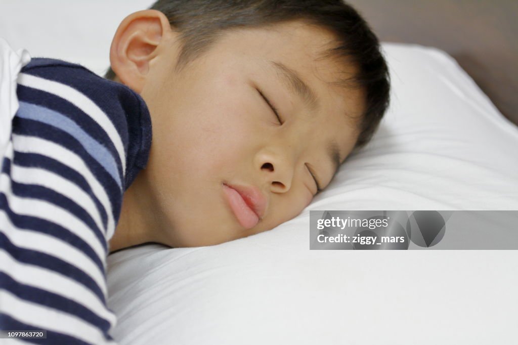 Sleeping Japanese boy (third grade at elementary school)
