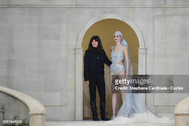 Virginie Viard and Vittoria Ceretti walk the runway during the Chanel Spring Summer 2019 show as part of Paris Fashion Week on January 22, 2019 in...