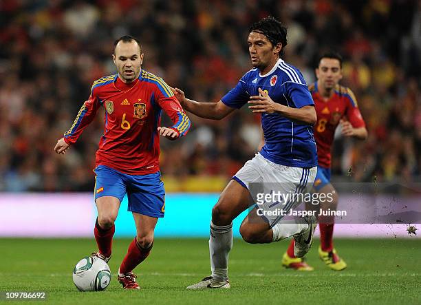 Andres Iniesta of Spain duels for the ball with Abel Aguilar of Colombia during the International friendly match between Spain and Colombia at...