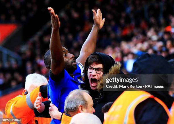 Cardiff City's Sol Bamba celebrates scoring his sides first goal of the match with a fan during the Premier League match at St Mary's Stadium,...