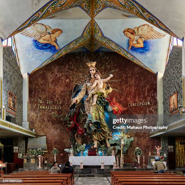 the impressive statue of the virgin mary in the basilica of the immaculate conception in chignahuapan, mexico - chignahuapan stock pictures, royalty-free photos & images