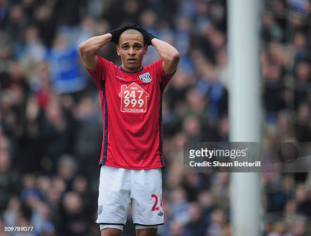 Peter Odemwingie of West Bromwich Albion holds his head in his hands after missing an easy chance during the Barclays Premier League match between...