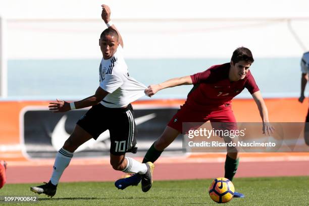 Armindo Sieb of Germany U16 challenges Antonio Silva of Portugal U16 during UEFA Development Tournament match between U16 Germany and U16 Portugal at...