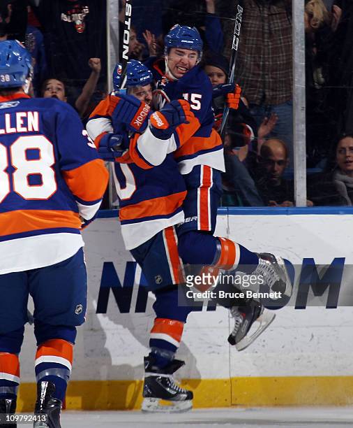 Parenteau of the New York Islanders scores at 19:09 of the first period against the St. Louis Blues and jumps into the arms of Michael Grabner at the...