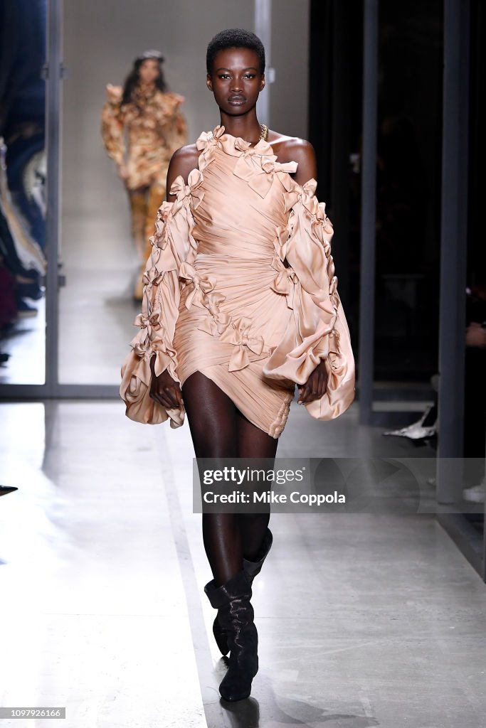 A model walks the runway for the Zimmermann fashion show during New ...