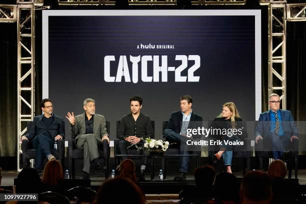 Grant Heslov, George Clooney, Christopher Abbott, Kyle Chandler, Ellen Kuras and Luke Davies of 'Catch 22' speak onstage during the Hulu Panel during...