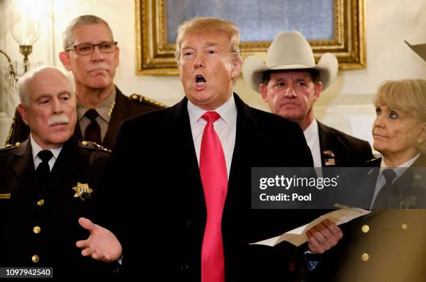 President Donald Trump speaks to the press after meeting with sheriffs from across the country in the Diplomatic Reception Room at the White House...