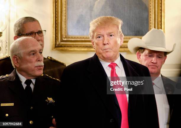 President Donald Trump speaks to the press after meeting with sheriffs from across the country in the Diplomatic Reception Room at the White House...