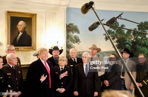 President Donald Trump speaks to the press after meeting with sheriffs from across the country in the Diplomatic Reception Room at the White House...
