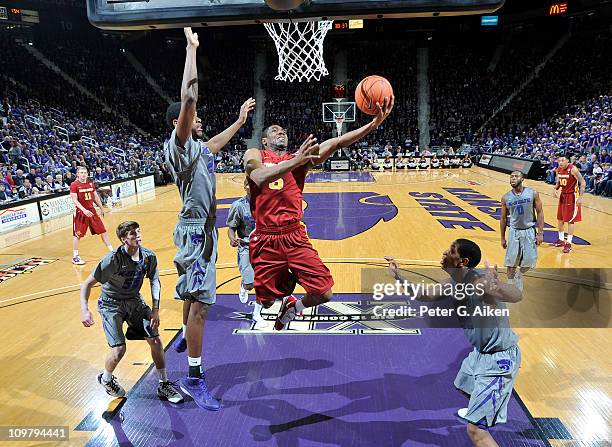 Guard Jake Anderson of the Iowa State Cyclones drives through the lane and scores against the Kansas State Wildcats during the second half on March...