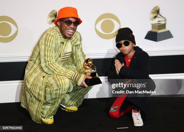 Anderson .Paak and his son Soul Rasheed pose in the press room with his award for Best Rap Performance award for 'Bubblin,' during the 61st Annual...