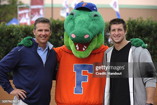 In this handout photo provided by Disney Parks, ESPN college football analyst and former University of Florida football coach, Urban Meyer, "Albert"...