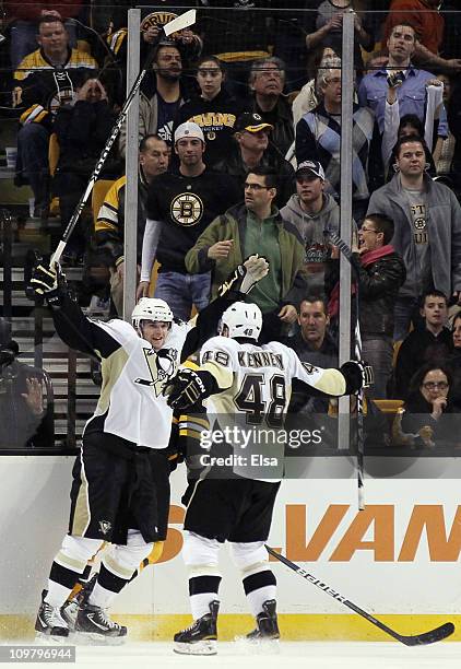 Dustin Jeffrey of the Pittsburgh Penguins is congratulated by teammate Tyler Kennedy after Jeffrey scored the game winner in overtime on March 5,...