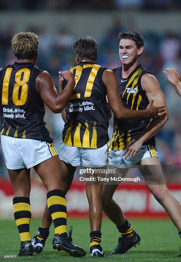 David Rodan David Rodan Andrew Krakouer and Brad Ottens for Richmond celebrate a ...