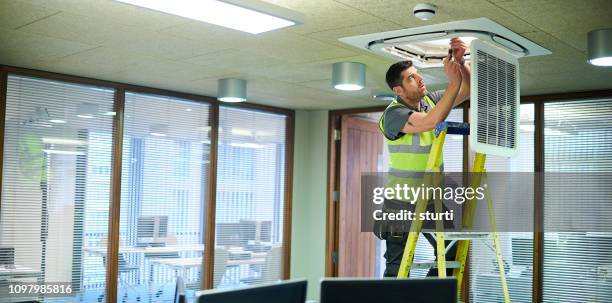 air con maintenance engineer - pro con stock pictures, royalty-free photos & images