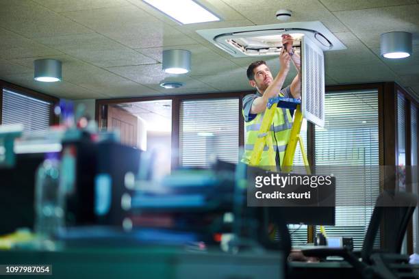 air con maintenance engineer - repairing stock pictures, royalty-free photos & images