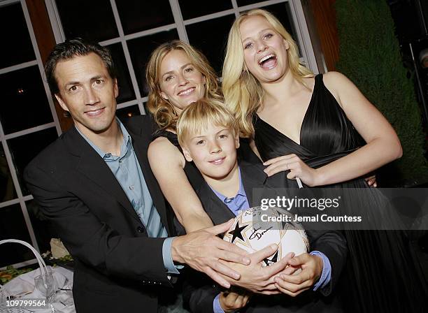 Andrew Shue, Elisabeth Shue and Carly Schroeder with Gregory