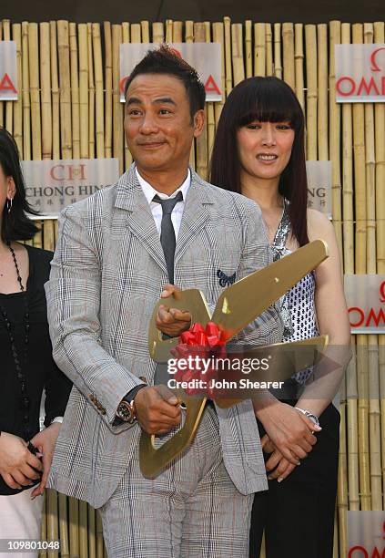 Simon Yam, OMEGA Ambassador and Qi Qi, OMEGA Ambassador