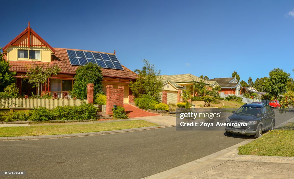 Sunny summer day in Hallam, Australia. Beautiful houses and well-kept streets.