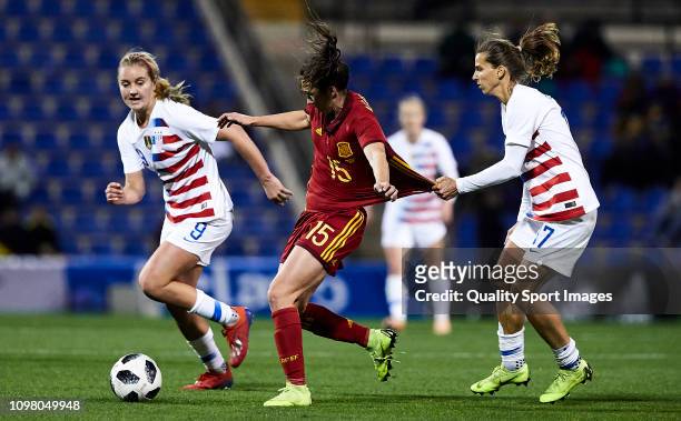 Tobin Heath of The United States commits fault over Silvia Meseguer of Spain during the Women's International Friendly match between Spain and The...