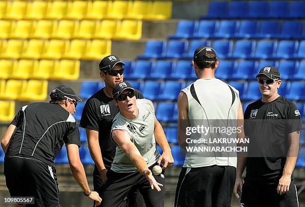 New Zealand cricketer Martin Guptill takes part in a warm up game with teammates during a practice session at The Pallekele International Cricket...