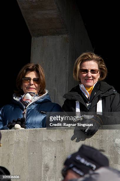 Queen Silvia of Sweden and Queen Sonja of Norway attend the Men's 50km Free Mass Start in the FIS Nordic World Ski Championships 2011 at Holmenkollen...