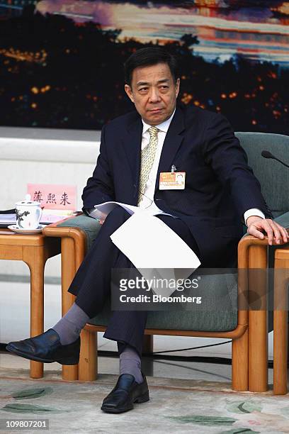 Bo Xilai, Secretary of Chongqing Municipal Committee of the Communist Party of China, attends a meeting during the annual National People's Congress...
