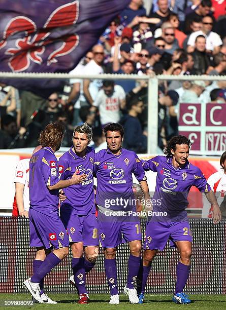 Adrian Mutu of ACF Fiorentina celebrates with team mates after scoring the opening goal during the Serie A match between ACF Fiorentina and Catania...