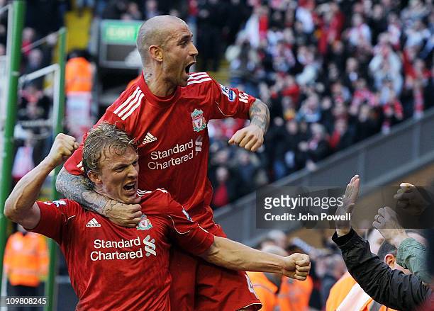 Dirk Kuyt of Liverpool celebrates his third goal with Raul Meireles during the Barclays Premier League match between Liverpool and Manchester United...