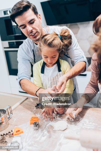 Making A Mess Dad Making A Mess In The Kitchen Photos and Premium High Res Pictures ...