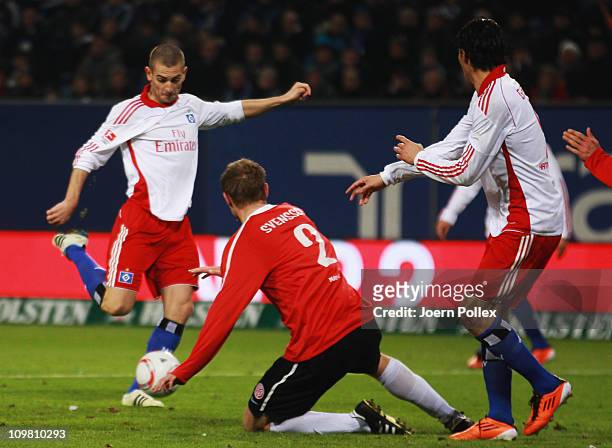 Mladen Petric of Hamburg scores his team's second goal during the Bundesliga match between Hamburger SV and FSV Mainz 05 at Imtech Arena on March 6,...