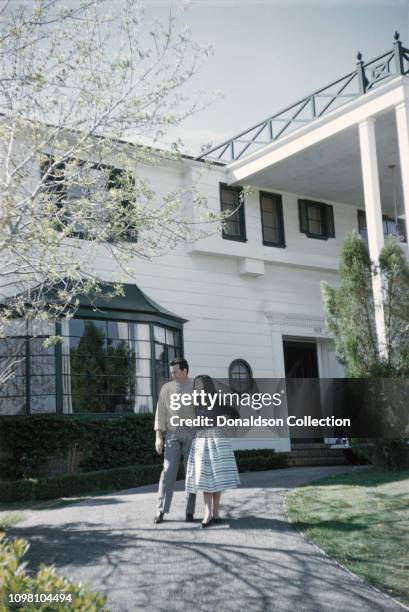 Actress Pier Angeli and husband singer Vic Damone pose for a portrait at home on March 15, 1957 in Los Angeles, California.