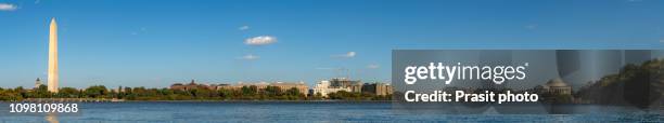 washington dc national mall, including washington monument and thomas jefferson memorial with mirror reflections on water - washington monument washington dc stock pictures, royalty-free photos & images